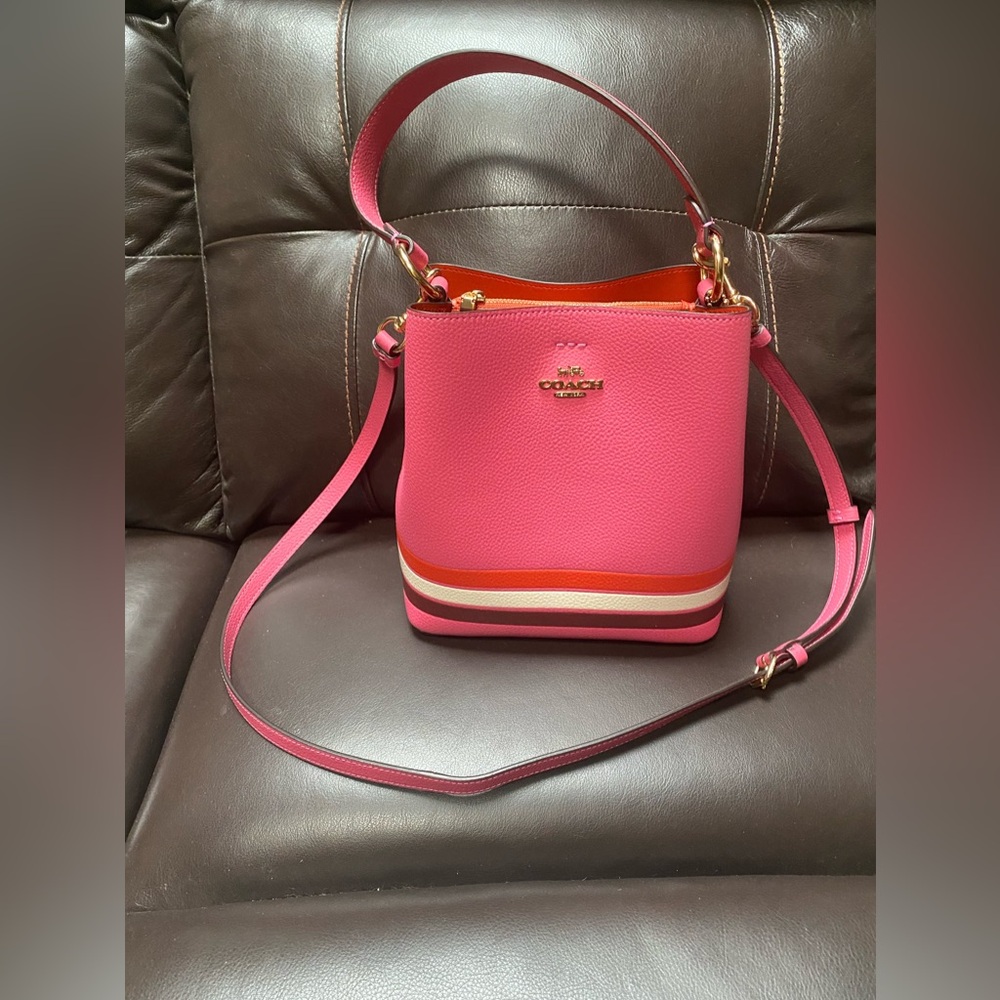 Coach purse pink never used new with tags.